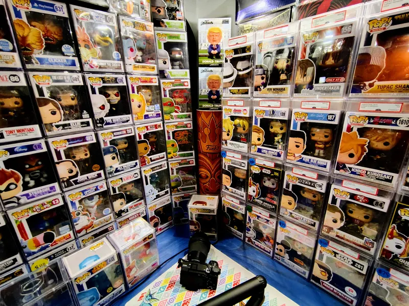A collection of boxed vinyl figures